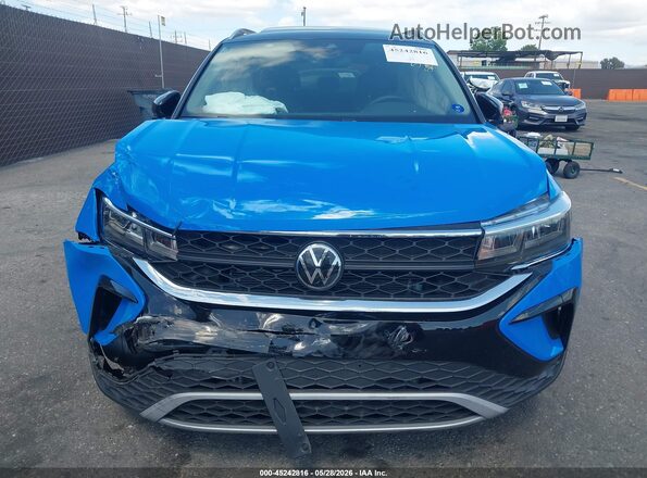 3VVEX7B28RM075002 2024 VOLKSWAGEN TAOS Blue Instrument cluster view