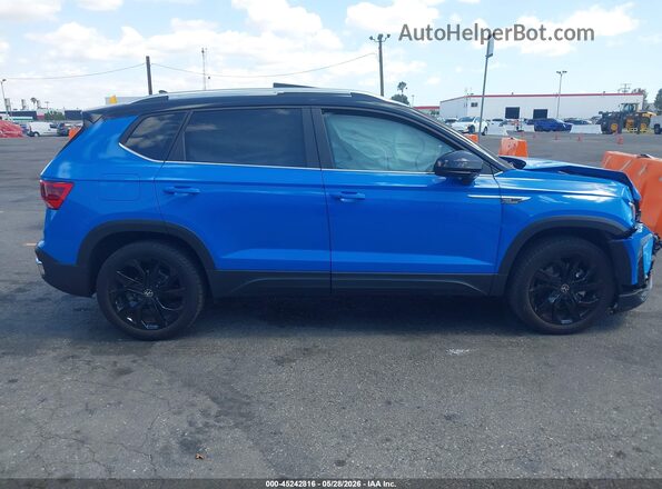 3VVEX7B28RM075002 2024 VOLKSWAGEN TAOS Blue Rear interior view