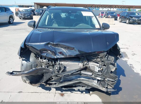 3VVFX7B22PM347772 2023 VOLKSWAGEN TAOS Black Սալոնի հետևի տեսք