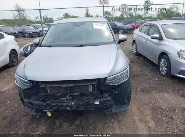 3VVMB7AX5PM106484 2023 VOLKSWAGEN TIGUAN Silver Widok wnętrza z tyłu