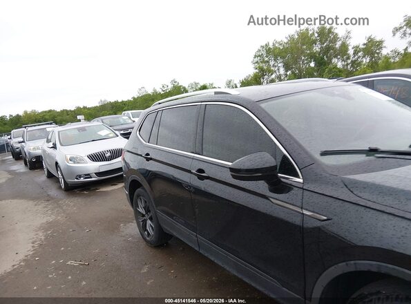 3VVMB7AX6PM006572 2023 VOLKSWAGEN TIGUAN Black Widok wnętrza z tyłu