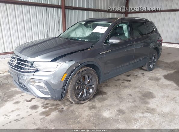 3VVNB7AX0PM093955 2023 VOLKSWAGEN TIGUAN Gray Vista tres cuartos delantera izquierda