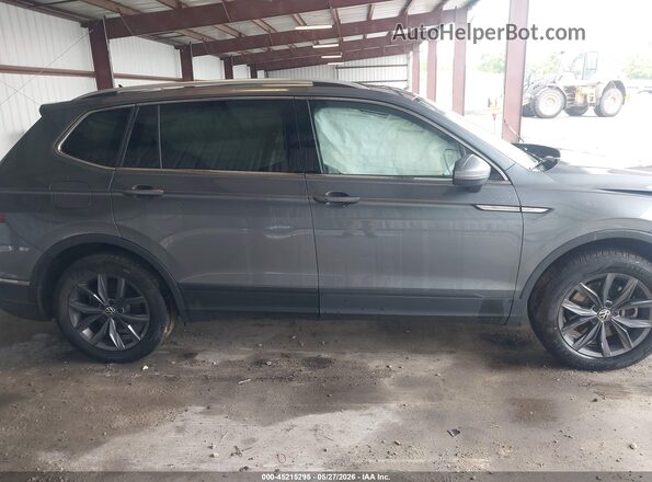 3VVNB7AX0PM093955 2023 VOLKSWAGEN TIGUAN Gray Vista interior trasera