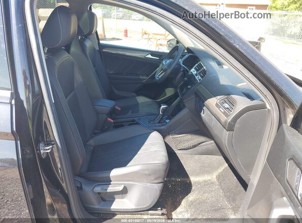 3VVNB7AX8PM042817 2023 VOLKSWAGEN TIGUAN Black Front interior view