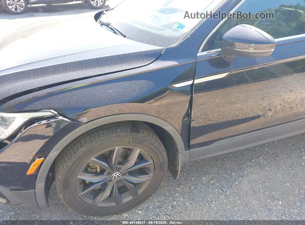 3VVNB7AX8PM042817 2023 VOLKSWAGEN TIGUAN Black Front view