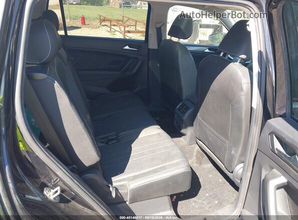 3VVNB7AX8PM042817 2023 VOLKSWAGEN TIGUAN Black VIN sticker view
