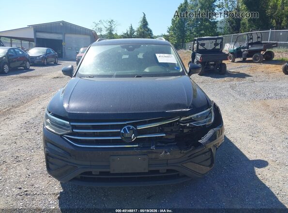 3VVNB7AX8PM042817 2023 VOLKSWAGEN TIGUAN Black Rear interior view