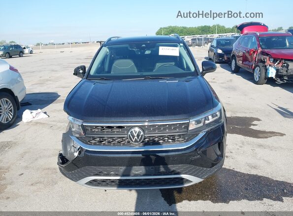 3VVNX7B22PM308613 2023 VOLKSWAGEN TAOS Black Widok wnętrza z tyłu