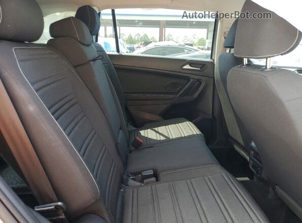 3VVRB7AX9RM153073 2024 VOLKSWAGEN TIGUAN Silver Vista interior trasera