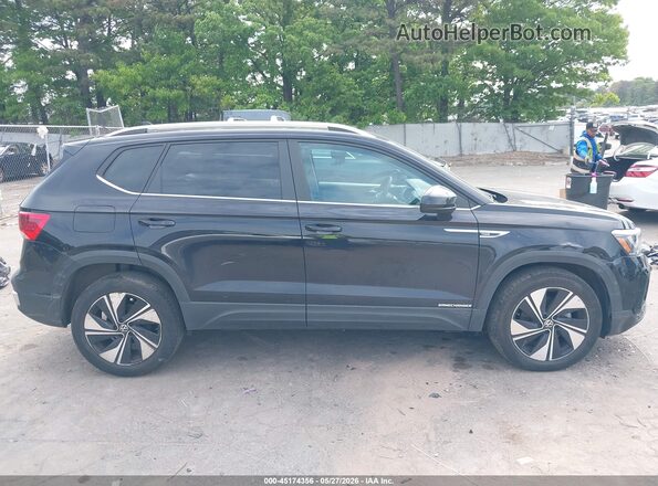 3VVVX7B21PM359357 2023 VOLKSWAGEN TAOS Black Rear interior view