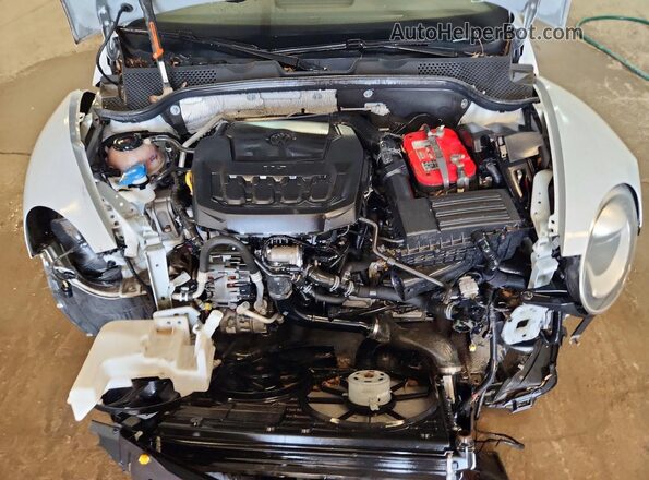 3VW5DAAT4JM506547 2018 VOLKSWAGEN BEETLE Silver Вид задньої частини салону
