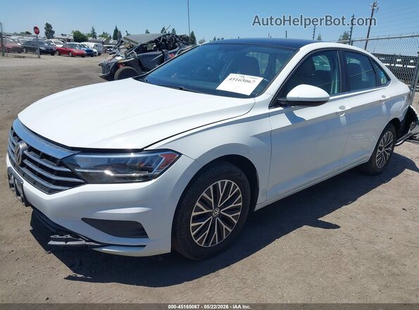 3VWC57BU6KM021889 2019 VOLKSWAGEN JETTA White წინა მარცხენა ხედი სამი მეოთხედიდან