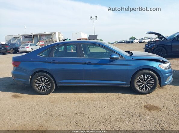 3VWCB7BU7KM215288 2019 VOLKSWAGEN JETTA Blue Սալոնի հետևի տեսք