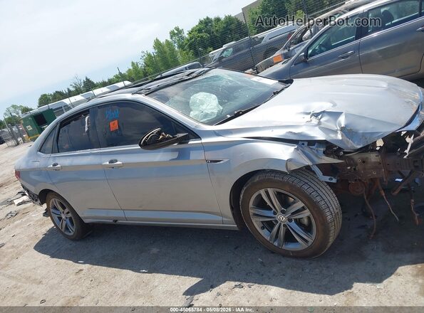 3VWCB7BU9KM216474 2019 VOLKSWAGEN JETTA Silver Rear interior view