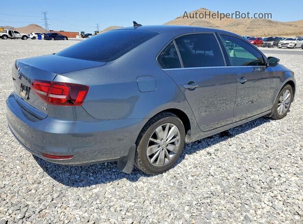 3VWD67AJ8GM318758 2016 VOLKSWAGEN JETTA Gray 