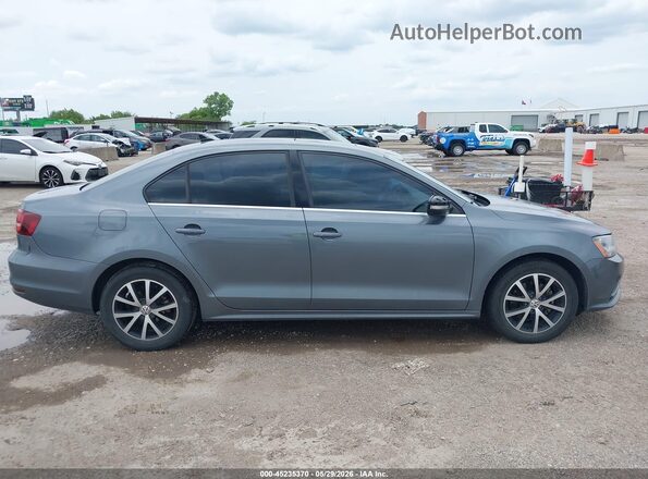 3VWDB7AJ0HM270217 2017 VOLKSWAGEN JETTA Gray Вид задньої частини салону