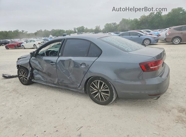 3VWDB7AJ3JM222989 2018 VOLKSWAGEN JETTA Gray Tył lewy