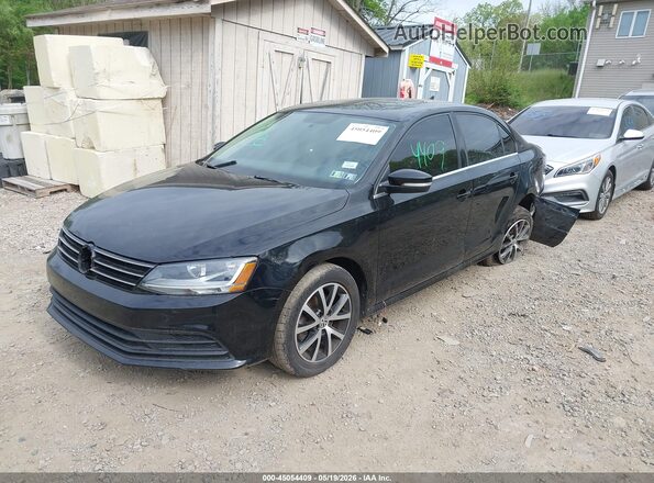 3VWDB7AJ6HM285658 2017 VOLKSWAGEN JETTA Black Առջևի ձախ երեք քառորդ տեսարան
