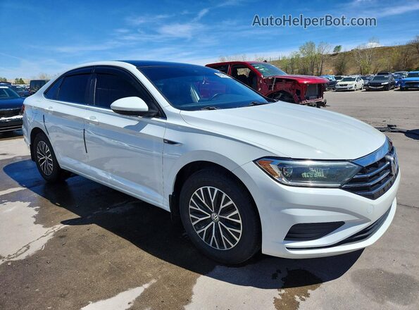 3VWE57BU7KM199447 2019 VOLKSWAGEN JETTA White Delantero derecho