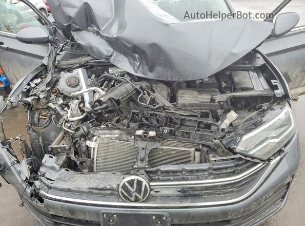 3VWEM7BU6NM010844 2022 VOLKSWAGEN JETTA Gray Vista interior trasera