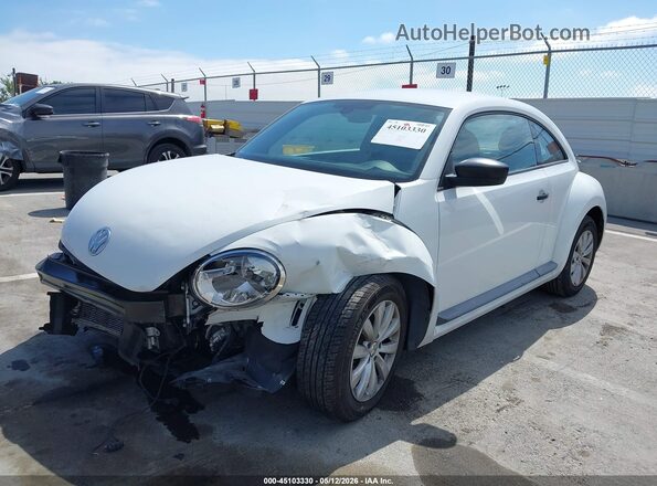 3VWF17AT0HM614285 2017 VOLKSWAGEN BEETLE White Front left