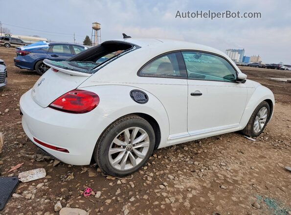 3VWF17AT7HM623114 2017 VOLKSWAGEN BEETLE White Trasero derecho