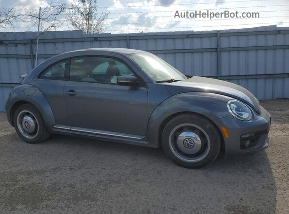 3VWJ17AT0HM632828 2017 VOLKSWAGEN BEETLE Gray Delantero derecho
