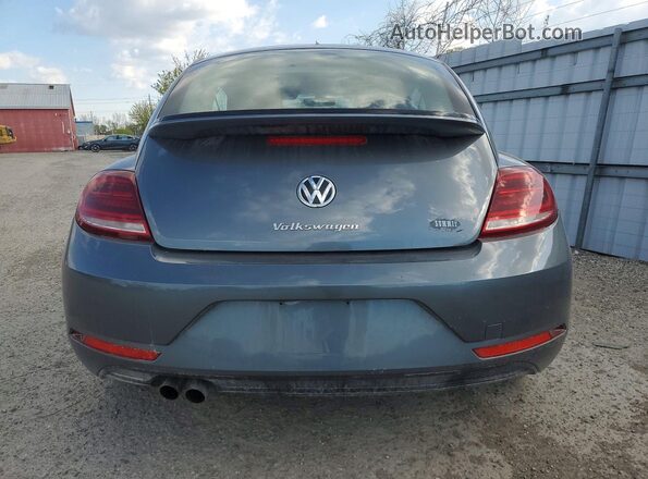 3VWJ17AT0HM632828 2017 VOLKSWAGEN BEETLE Gray Vista trasera
