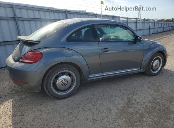 3VWJ17AT0HM632828 2017 VOLKSWAGEN BEETLE Gray Trasero derecho