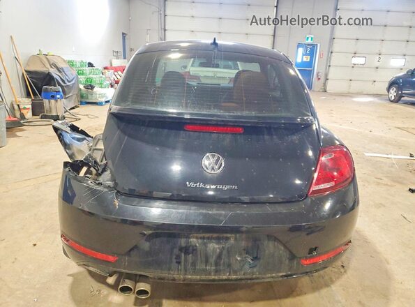 3VWJ17AT7HM604170 2017 VOLKSWAGEN BEETLE Черный Вид сзади