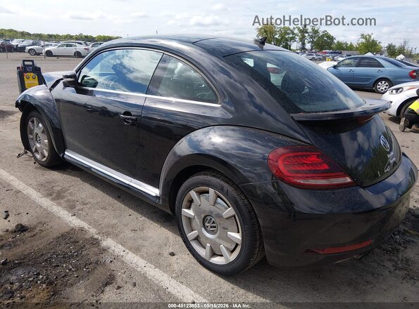 3VWJD7AT3JM714176 2018 VOLKSWAGEN BEETLE Black Tył lewy