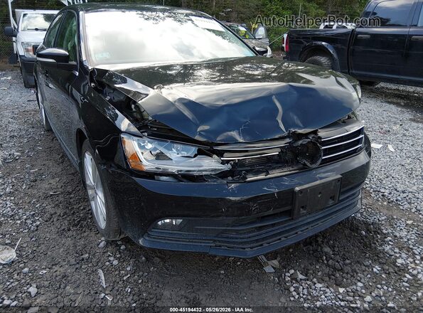 3VWL17AJ5HM350577 2017 VOLKSWAGEN JETTA Black Front view