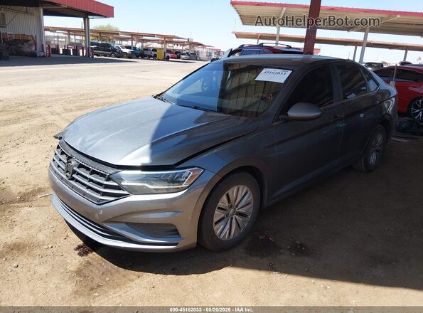 3VWN57BU1KM090417 2019 VOLKSWAGEN JETTA Gray წინა მარცხენა ხედი სამი მეოთხედიდან