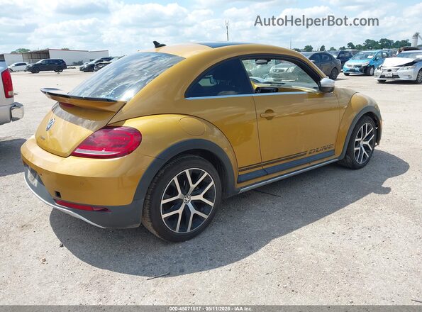 3VWS17AT6HM622776 2017 VOLKSWAGEN BEETLE Gold Rear right