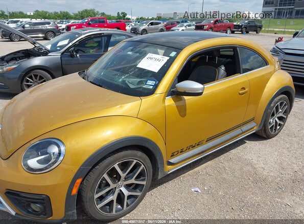 3VWS17AT6HM622776 2017 VOLKSWAGEN BEETLE Gold Front view