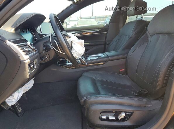 WBA7E4C51KGV28667 2019 BMW 7 SERIES Gray Вид панелі приладів