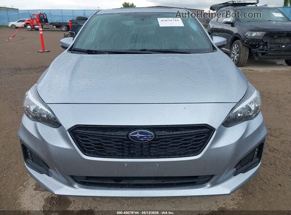 4S3GTAM64K3715469 2019 SUBARU IMPREZA Silver Rear interior view