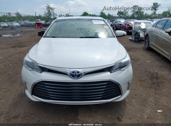 4T1BD1EB0GU051087 2016 TOYOTA AVALON HYBRID White ხელსაწყოთა პანელის ხედი
