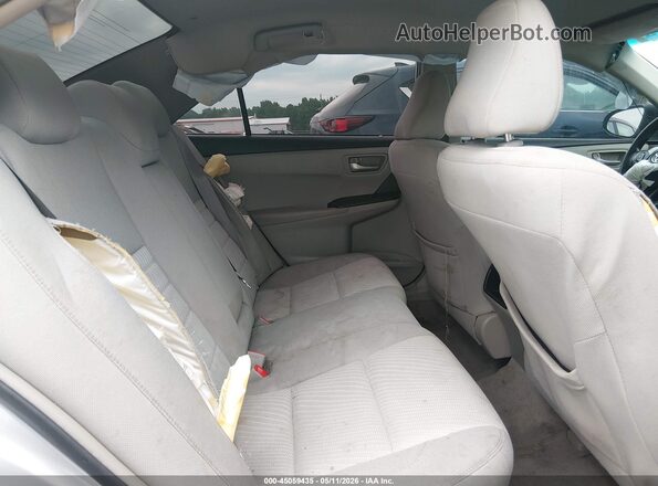 4T1BF1FK1GU504707 2016 TOYOTA LE Silver Widok naklejki z numerem VIN