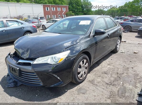 4T1BF1FK2GU265653 2016 TOYOTA CAMRY Black Առջևի ձախ երեք քառորդ տեսարան