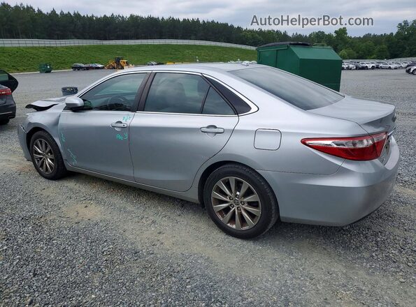 4T1BF1FK8GU137921 2016 TOYOTA CAMRY Silver Rear left