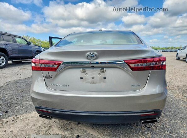 4T1BK1EB2HU257437 2017 TOYOTA AVALON Желто-коричневый Вид сзади