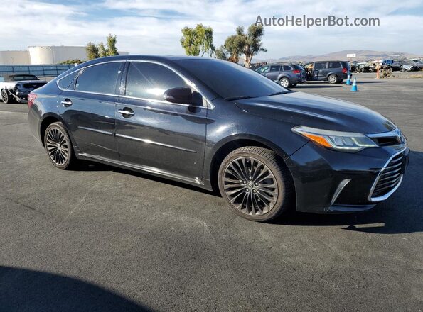 4T1BK1EB5GU205248 2016 TOYOTA AVALON Black Front right