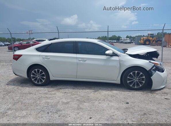 4T1BK1EB5GU217044 2016 TOYOTA AVALON White Սալոնի հետևի տեսք
