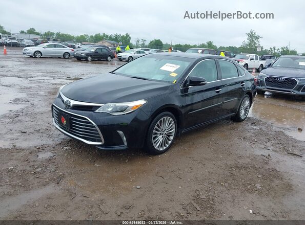 4T1BK1EB6JU281925 2018 TOYOTA AVALON Black Front left