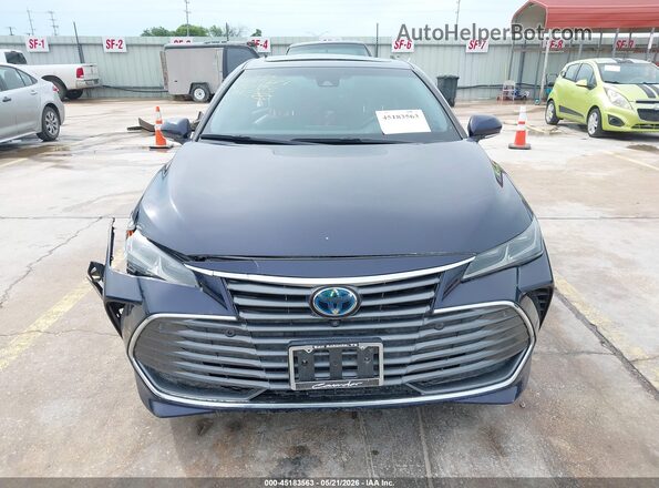 4T1DA1AB6MU010983 2021 TOYOTA AVALON Light Blue Вид задньої частини салону