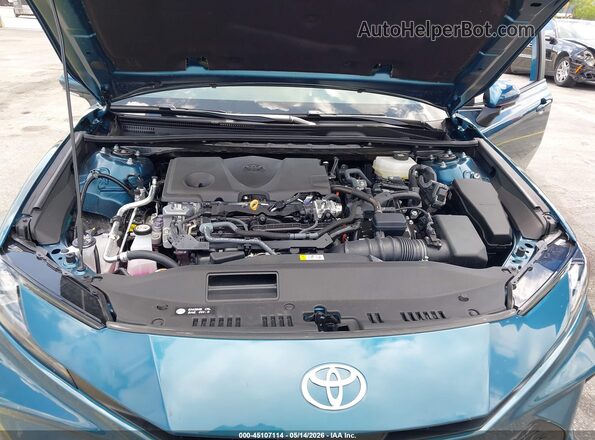 4T1DAACK0TU263082 2026 TOYOTA CAMRY Turquoise Rear view