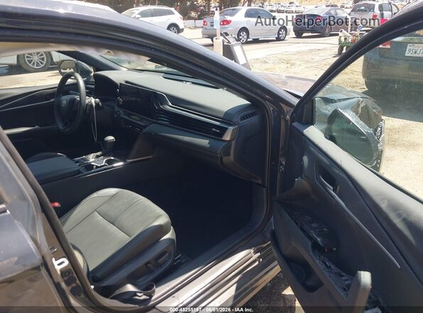4T1DAACK2SU199660 2025 TOYOTA CAMRY Gray Вид салону спереду