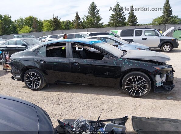 4T1DAACK5SU005249 2025 TOYOTA CAMRY Black Вид задньої частини салону