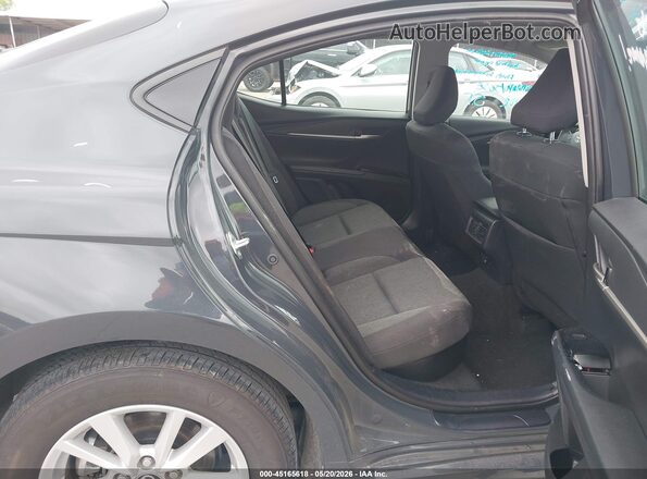 4T1DAACK5SU045332 2025 TOYOTA CAMRY Gray Widok naklejki z numerem VIN